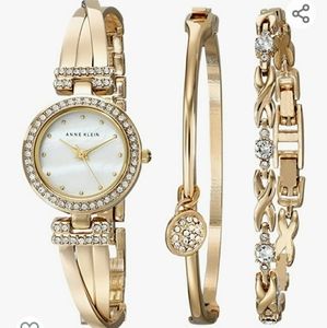 Anne Klein Women's AK/1868GBST Premium Crystal-Accented Gold-Tone Bangle Watch a